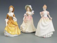 Three Royal Doulton figurines including Sandra, Gift of Love etc, tallest 22cm