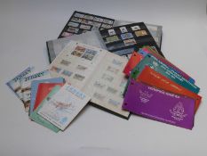 Three stockbooks of mint Jersey, Guernsey and Isle of Man stamps, together with stamp booklets