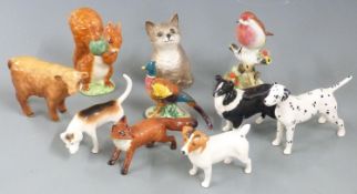 Beswick dog, cat and other figures including Highland calf, fox, hound, Beatrix Potter etc,