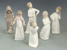 Seven Nao child figures including girl with candle, tallest 29cm