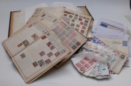 Three albums of all world stamps and a box of loose stamps, covers etc