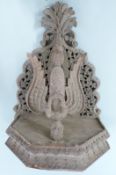 Nepalese/ Anglo Indian carved figural shelf bracket with fretwork decoration, the central figure the