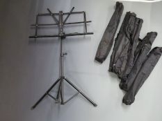 Six music stands with soft carry cases