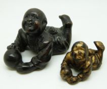 Chinese 19thC bronze model of a boy playing with ball and another smaller example