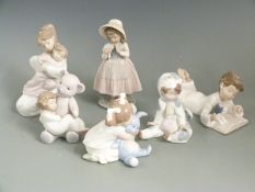 Six Nao child figures including several with toys, tallest 20cm