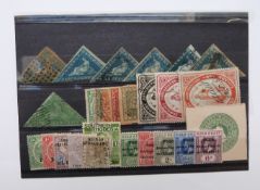 A stock card of Cape triangle stamps (7) and other early African and British Guiana stamps