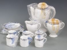 Wedgwood coffee service decorated in the Amhurst pattern, in original plastic packaging, unused