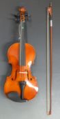 21stC anonymous three-quarter size violin with 34cm single piece back, in fitted gig case,