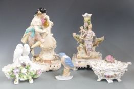 Continental figures including a figural candlestick, Naples bow pot, figural bird salt etc,