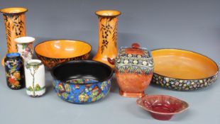 Crown Ducal pair of orange lustre pedestal vases and matching bowl, further Crown Ducal bowls and