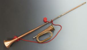 Copper and brass bugle with silvered mouthpiece together with a copper and brass coaching horn