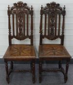 Pair of Victorian oak hall chairs with carved lion decoration