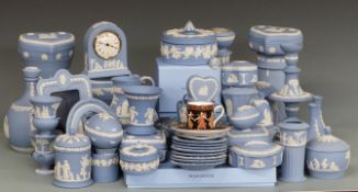 A large collection of Wedgwood Jasperware ceramics including vases, clock, candlesticks, picture