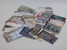 A collection of GB mint definitive packs, prestige stamp books etc, high face value