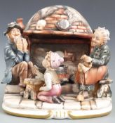 A large Capodimonte figural group, playing cards, H24cm