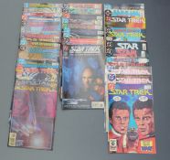 Twenty-nine DC comics Star Trek comprising 1 x3, 2, 3, 4 x3, 5 x2, 6 x2, 7, 8, 10-14, 19, 24 x2, 33,