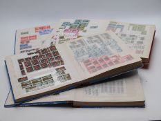 A substantial quantity of mint GB stamps 1935-1981, singles and blocks, in four large stockbooks