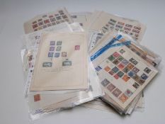 A large quantity of all-world stamps on loose album sheets