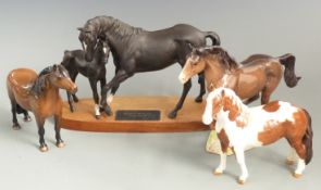 Four Beswick horses, Skewbald, Cowboy's horse, Black Beauty with foal and Dartmoor, tallest 20cm