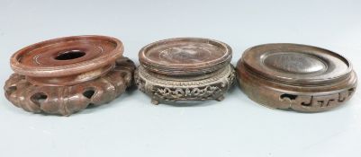 Three 19thC/20thC Chinese carved and pierced hardwood stands, largest H6 x D16.5cm