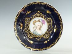A 19thC cabinet plate with hand-painted rondal of a lady, possibly by Sampson of Paris, Vienna