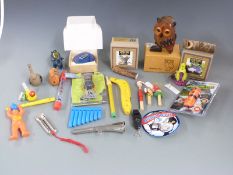 A large collection of modern novelty whistles, some in original boxes/ packaging.