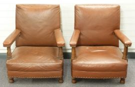 A pair of oak framed war department, birch and maple arm chairs marked WD