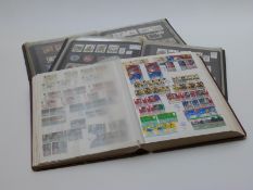 Three stockbooks of mint GB stamps 1953-2001. High face value