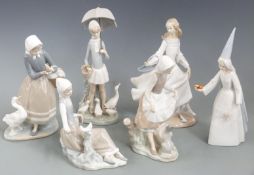Six Lladro figures including girl with umbrella and Cinderella, tallest 27cm