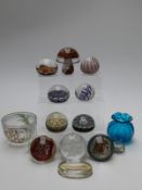 A collection of paperweights including Perthshire and Murano