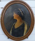 Late 19th/20thC oval oil on board portrait of a lady with scarf and headband, 49 x 40cm