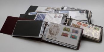 Five First Day Cover albums containing covers from 1972 to 2013 including one Guernsey album, 2013