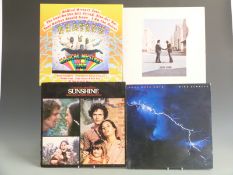 Approximately 90 albums, mostly 1980s including The Beatles