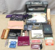 A collection of drawing equipment, calculators, rulers, slide rules etc