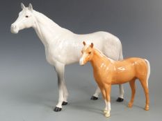 Beswick dappled grey large racehorse and a palomino, tallest 29cm