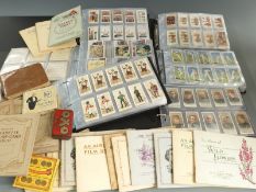 Six albums of cigarette cards to include Wills's Cricketers, Old Inns, Butterflies and Moths,