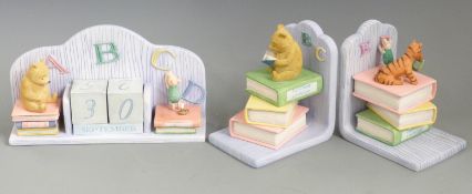 Two Border Fine Arts Winnie the Pooh Nursery Collection figural bookends and calendar