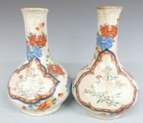 Pair of Japanese crackle glaze vases with floral decoration, 24.5cm