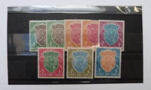 India mint stamps. 1909 overprints 2r-25r. 1925 surcharges 1r and 2r. 1911-22 1r-10r
