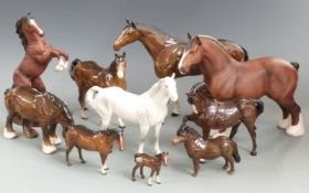 A collection of Beswick horses and foals including Burnham Beauty, tallest 28cm
