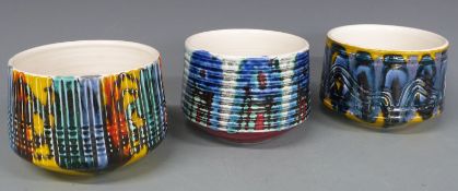 Three retro Poole ribbed jardinières, 11cm tall