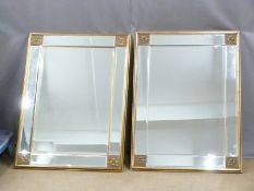 A pair of bevelled glass mirrors, W115 x D86