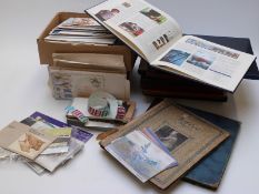 Ten Royal Mail special stamps yearbooks and contents together with a tray of mixed stamps