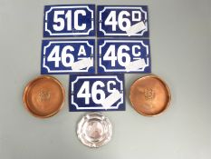 Five French enamel house numbers,10 x 15cm, two copper advertising pin dishes for Royal Exchange