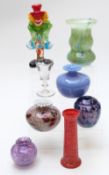 A collection of glassware including an early glass drinking glass, Guernsey etc