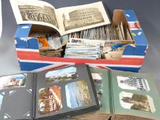Two postcard albums and a large quantity of loose cards, Edwardian onwards to include Swanage,