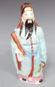 Chinese figure with impressed mark to base, 20cm tall