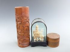 Chinese carved bamboo brush pot, cork model in case and a container of coasters, tallest 31cm