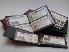 A large quantity of Great Britain first day covers in albums, includes some early covers and range