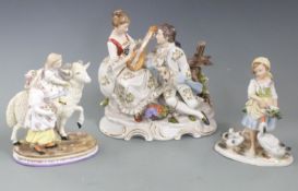 Dresden style figure of sweethearts, a figural group of a child riding a goat and a German figure of